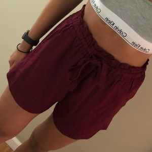 High waisted maroon shorts